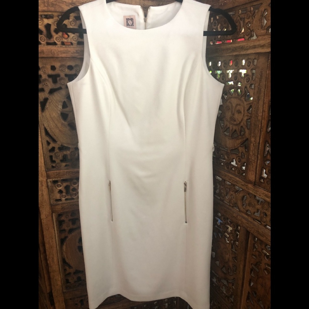 Classic white dress with gold accents